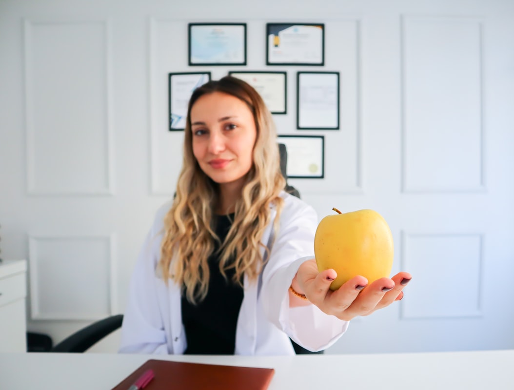 Nutritionist consulting with client about blood sugar management